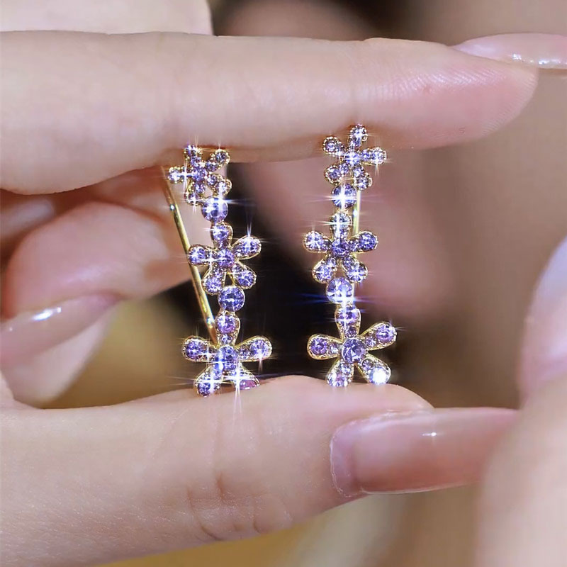 Øredobber med buede blomster